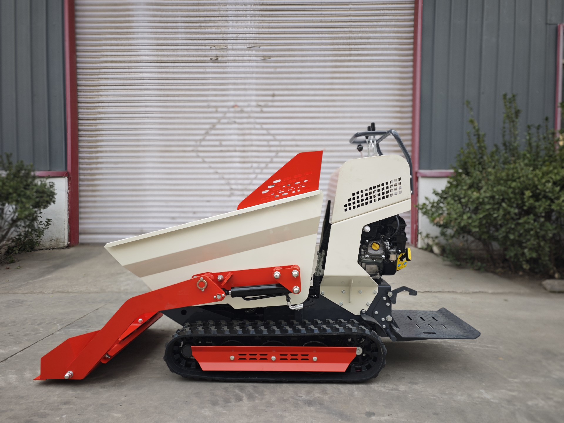 Multi-functional small skid steer loader, suitable for indoor demolition and construction site use.